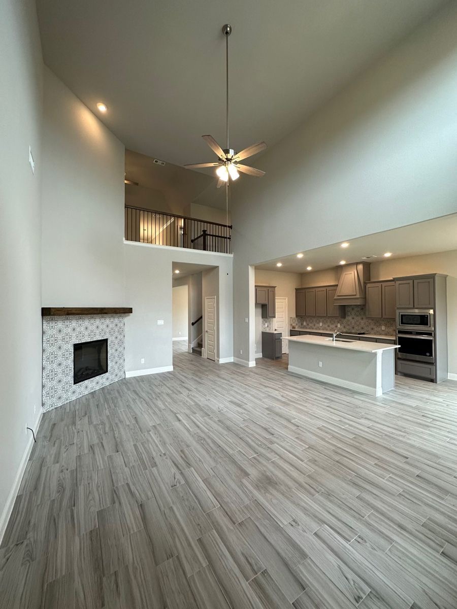 New wood-look plank flooring through an open-concept Vaughan main floor