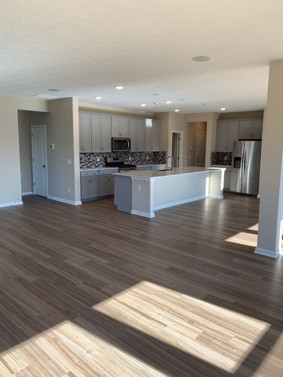 Renovated kitchen with large island and open sightlines in a Vaughan home
